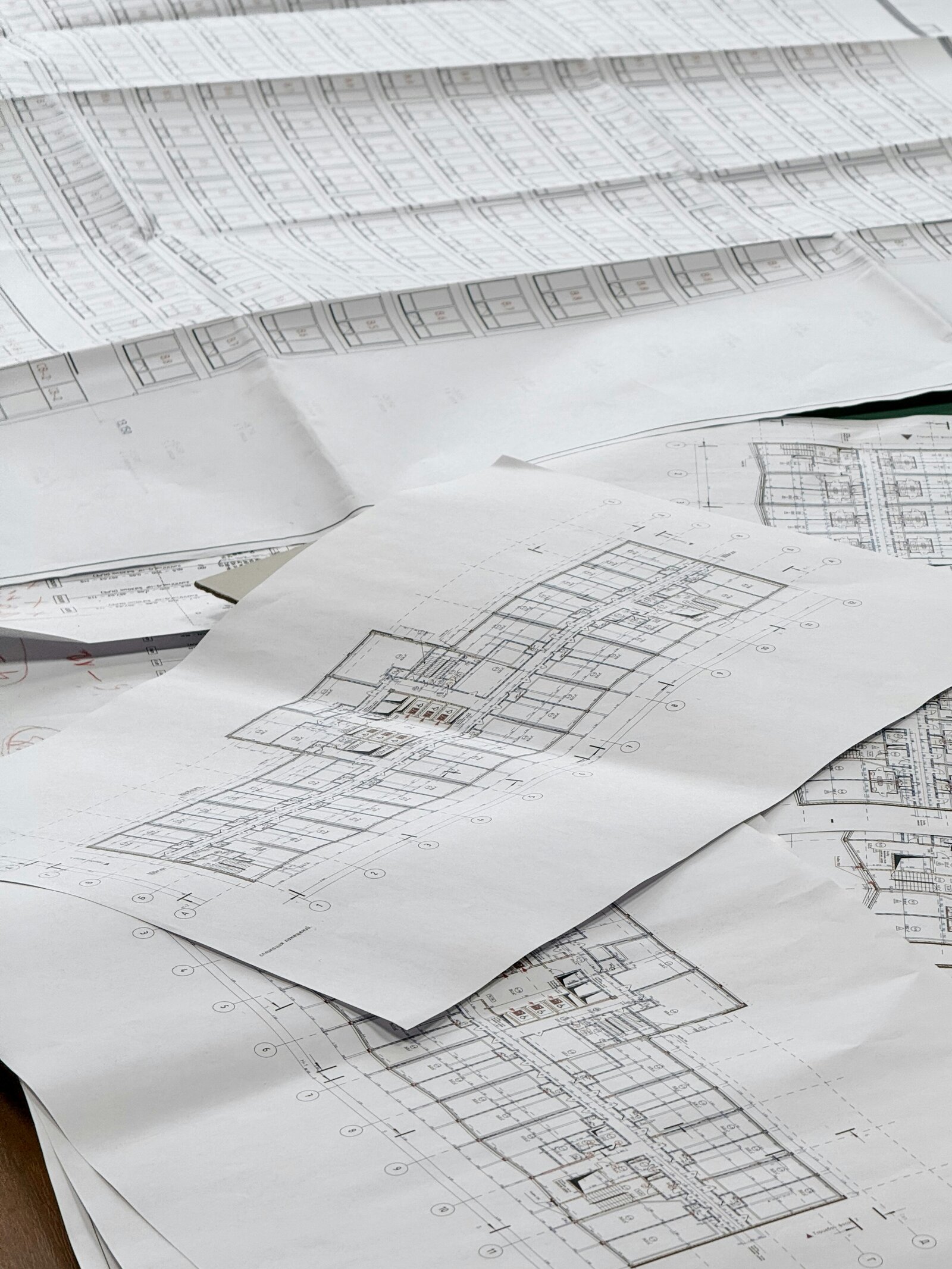 Architectural blueprints spread out on a surface